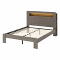 Letto matrimoniale in legno grigio con testiera LED