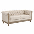 Divano in tessuto beige tre posti con struttura in legno
